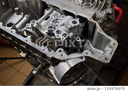 the engine ready to be reassembled on the car the engine ready to be reassembled on the car 110976070