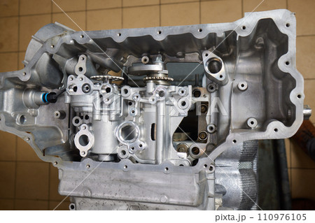 the engine ready to be reassembled on the car the engine ready to be reassembled on the car 110976105