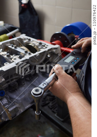 the engine ready to be reassembled on the car the engine ready to be reassembled on the car 110976422
