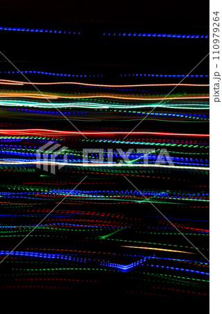 Abstract blurry background with pattern from colorful traces of lights Abstract blurry background with pattern from colorful traces of lights 110979264