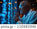 aged man working with futuristic screen interface 110983946