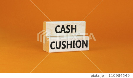 Cash cushion symbol. Concept words Cash cushion on beautiful wooden block. Beautiful orange table orange background. Business and Cash cushion concept. Copy space. 110984549