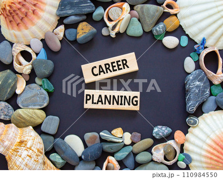Career planning symbol. Concept words Career planning on beautiful wooden block. Beautiful black table black background. Sea stone sea shell. Business, motivational career planning concept. Copy space 110984550