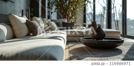 AI-generated content. Interior of bright minimalist living room in modern luxurious apartment. Comfortable corner sofa, stylish coffee table, indoor plants, home decor, large panoramic window AI-generated content. Interior of bright minimalist living room in modern luxurious apartment. Comfortable corner sofa, stylish coffee table, indoor plants, home decor, large panoramic window 110986971