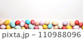 Top view of Easter eggs dyed in different colors on white background. Easter banner 110988096
