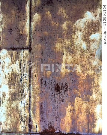 Rusty metal background with streaks of rust. Corroded metal background. Rust stains. Rusty corrosion. 110991154