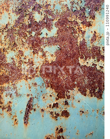 Rusty metal background with streaks of rust. Corroded metal background. Rust stains. Rusty corrosion. 110991240