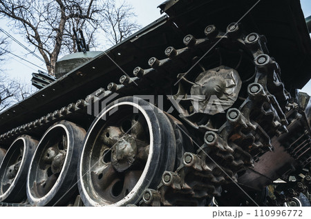 metal old caterpillar track of military army metal Soviet tank in close up 110996772