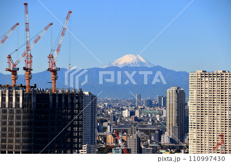 Japan's iconic symbol, Mt. Fuji, as seen from Minato-ku in central Tokyo Japan Japan's iconic symbol, Mt. Fuji, as seen from Minato-ku in central Tokyo Japan 110997430
