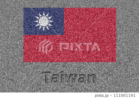 石板の上に描かれた台湾の国旗と、掘ったような「Taiwan」の文字 111001191