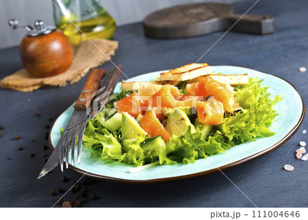 salad with fresh salmon, cucumber and olive oil salad with fresh salmon, cucumber and olive oil 111004646
