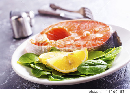 Salmon. Fresh raw salmon fish fillet with cooking ingredients Salmon. Fresh raw salmon fish fillet with cooking ingredients 111004654