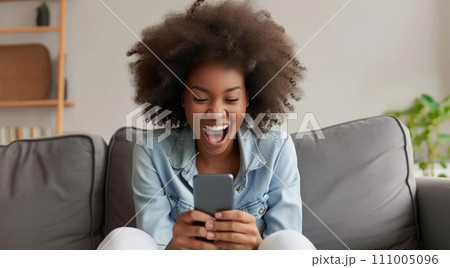 AI-generated content. Younge black happy girl playing on smartphone apps, betting money online and shopping online AI-generated content. Younge black happy girl playing on smartphone apps, betting money online and shopping online 111005096