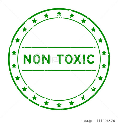 Grunge green non toxic word round rubber seal stamp on white background 111006576