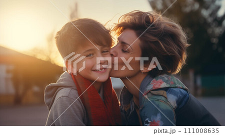 Generative AI Caucasian boy kisses his mother outside the house. 111008635