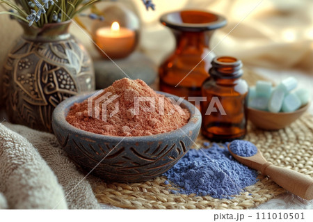 Spa still life with red and blue cosmetic moroccan clay and spa products, beautiful sunset Spa still life with red and blue cosmetic moroccan clay and spa products, beautiful sunset 111010501
