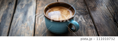 Cup of aromatic coffee cappuccino on a brown wooden background 111010732