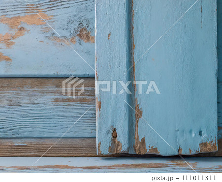 青いペンキの禿げた古い木材の背景素材（AI生成画像） 111011311