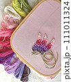 embroidery of flowers in French knot technic, canvas, threads mouline and needle 111011324