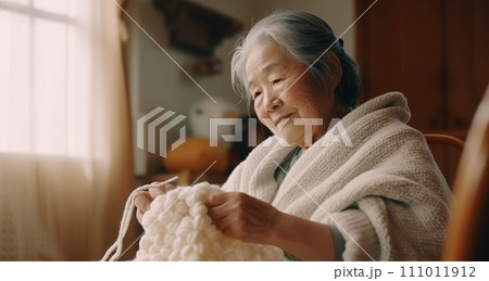 Generative AI An old Asian woman knits in the living room. 111011912
