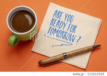 Are you ready for tomorrow question - handwriting on a napkin with a cup of coffee. Business and personal development concept. 111012585