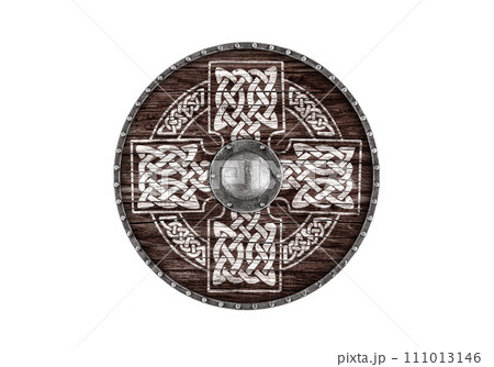 Old decorated wooden round shield isolated on white background Old decorated wooden round shield isolated on white background 111013146