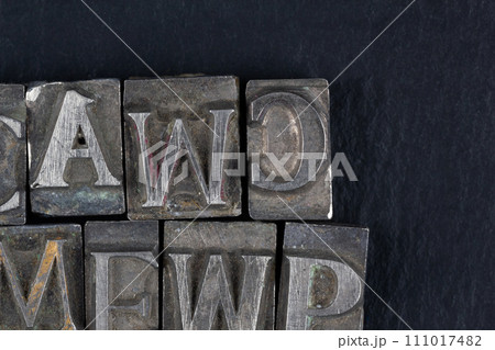 Antique vintage movable type alphabet set. 111017482