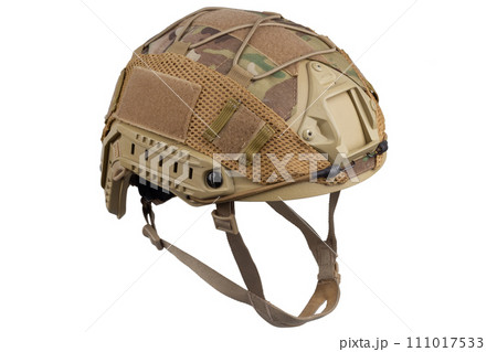Camouflaged military helmet. Camouflaged military helmet. 111017533