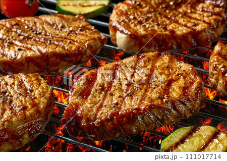 freshly grilled juicy steaks 111017714