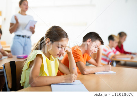 Young girl and boy studying subject in classroom 111018676