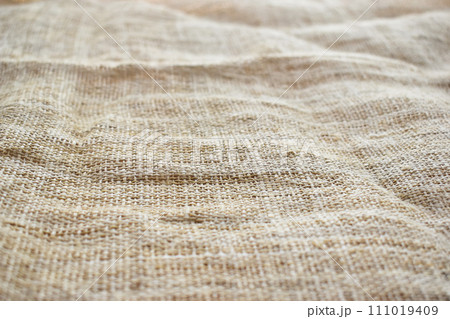 brown sackcloth texture background, crumpled burlap fabric textile for design 111019409