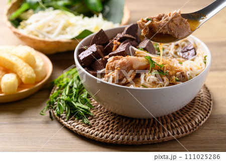 Northern Thai food (Kanom Jeen Nam Ngeaw), Spicy rice noodles soup with pork and pork blood  111025286