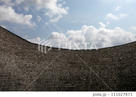 Roof of the building is covered with waterproof wooden tiles. 111027671