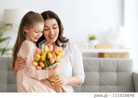 daughter and mom with flowers daughter and mom with flowers 111028698