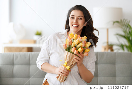 woman with flowers 111028717