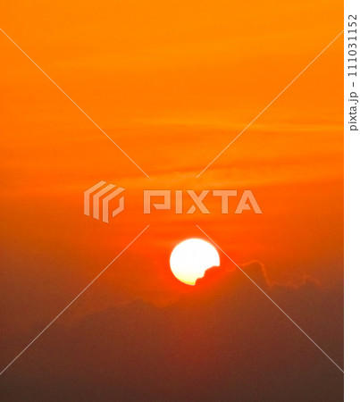 view of tourists enjoying the sunset on Kuta beach 111031152