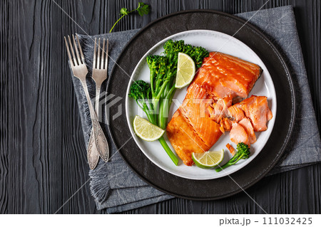 hot smoked salmon with cooked broccoli and lime 111032425