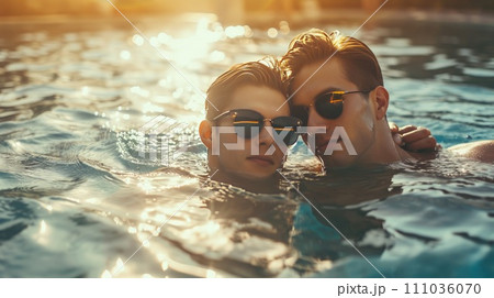 Gay couple relaxing in swimming pool. Gay couple relaxing in swimming pool. 111036070