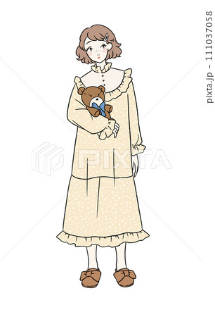 クマの人形を持ったパジャマ姿の女性 111037058