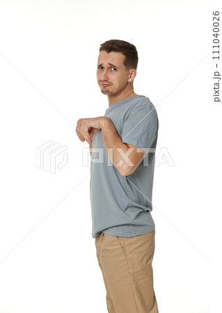 portrait of young funny man grimacing on white background portrait of young funny man grimacing on white background 111040026