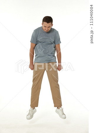 annoyed angry man shouting on white studio background annoyed angry man shouting on white studio background 111040084