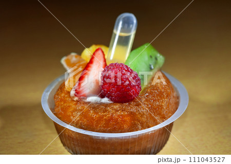 Tasty dessert on a yellow background Tasty dessert on a yellow background 111043527