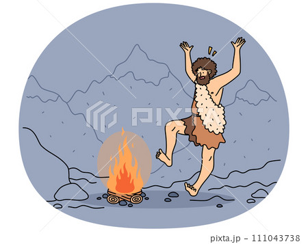 Indigenous man dancing near fire 111043738