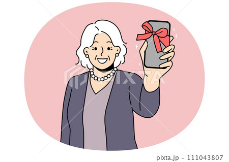 Smiling mature woman show smartphone as gift Smiling mature woman show smartphone as gift 111043807