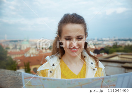 happy stylish woman in blouse in Prague Czech Republic 111044400