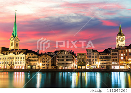 Sunset promenade near St. Peter's church and Fraumunster abbey, Zurich, Switzerland 111045263