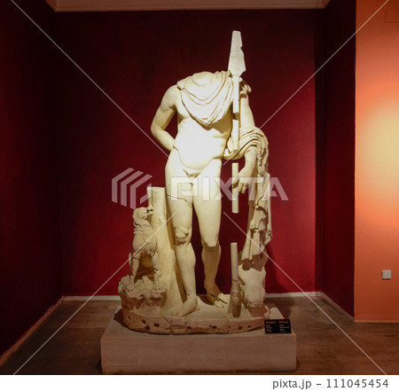Marble statues of gods and emperors of antiquity in the Museum of Antiquities of Antalya, Turkey. 111045454