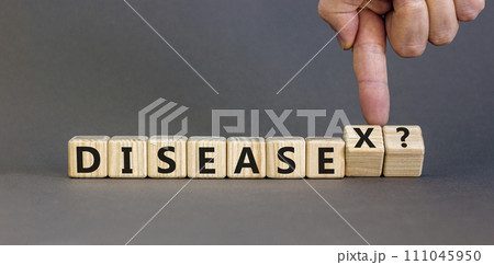Disease X after covid symbol. Turned cubes and changed the word Disease to Disease X. Beautiful grey table grey background. Doctor hand. Medical, Disease X after covid concept. Copy space. 111045950