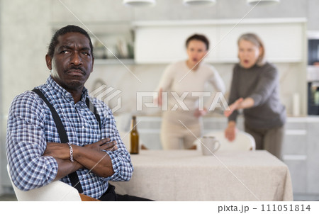 Adult woman and elderly woman quarreling with man 111051814