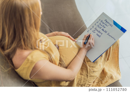 Expectant woman diligently compiles a list of childbirth costs, planning and organizing financial considerations for the upcoming delivery Expectant woman diligently compiles a list of childbirth costs, planning and organizing financial considerations for the upcoming delivery 111052780